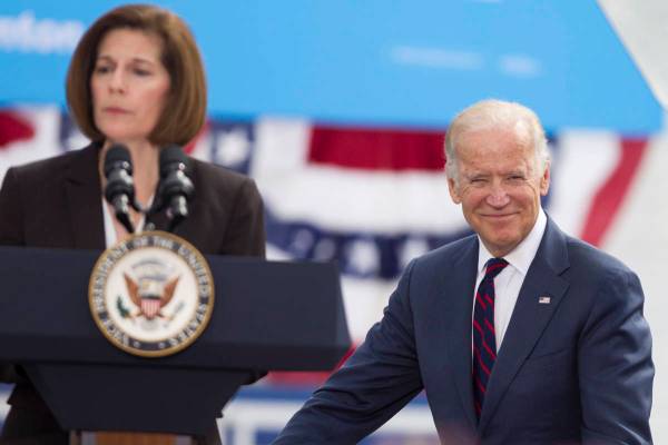 FILE--Vice President Joe Biden, right, looks on as Nevada Democratic U.S. Senate candidate Cath ...