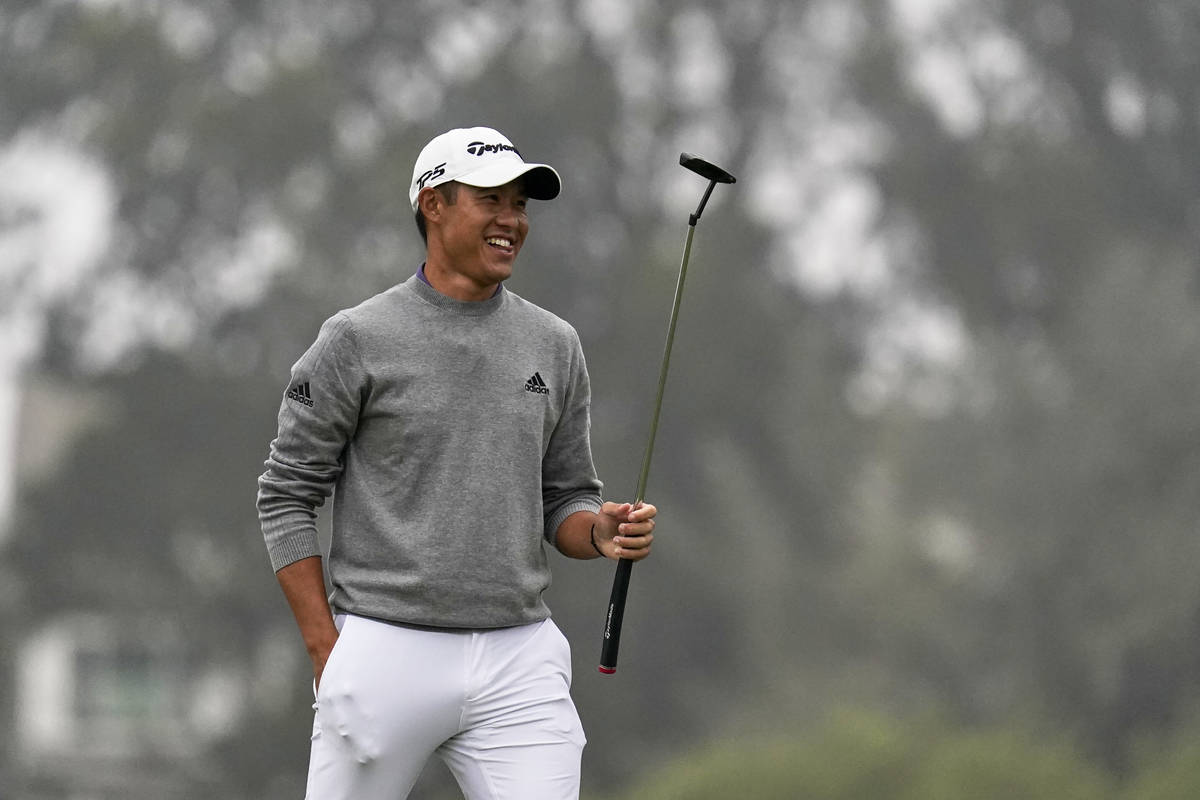 Collin Morikawa smiles after a birdie on the 16th hole during the final round of the PGA Champi ...