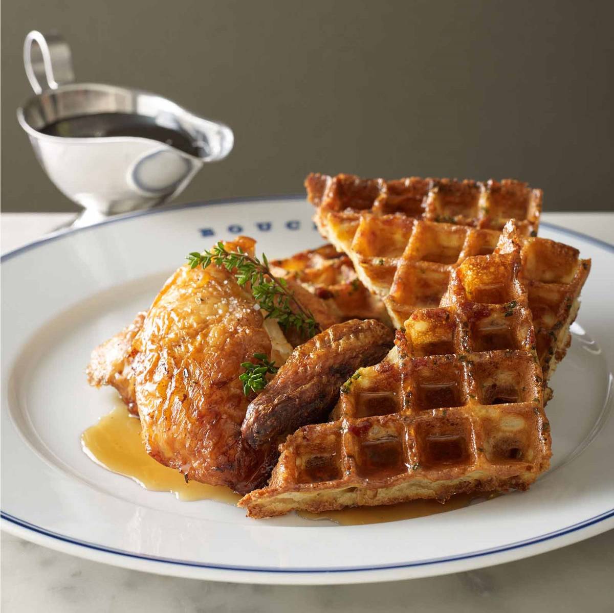 Roasted chicken with a bacon-chive waffle is on the menu during Bouchon's brunch. (Bouchon)