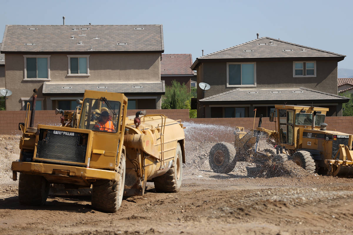 The construction site of the townhouse project Brownstones at Providence by Edward Homes in Las ...