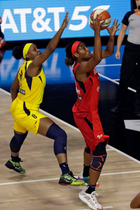 Las Vegas Aces forward Angel McCoughtry (35) shoots in front of Indiana Fever forward Kennedy B ...