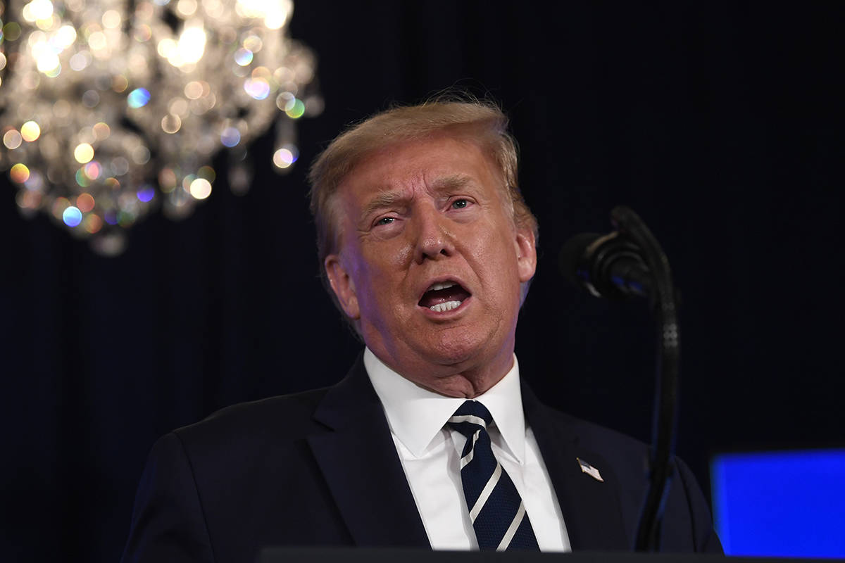 President Donald Trump speaks at Trump National Golf Club Bedminster in Bedminster, N.J., Frida ...