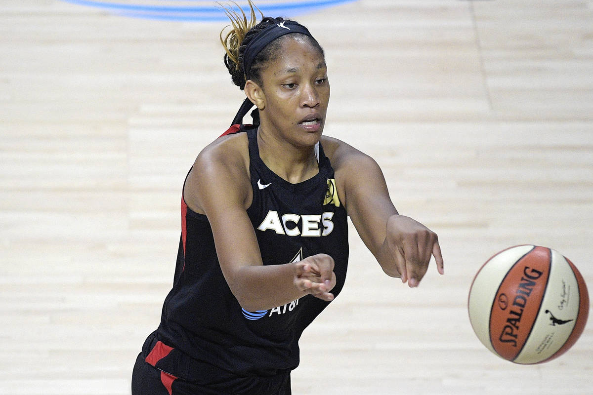 Las Vegas Aces forward A'ja Wilson (22) passes the ball during the second half of a WNBA basket ...