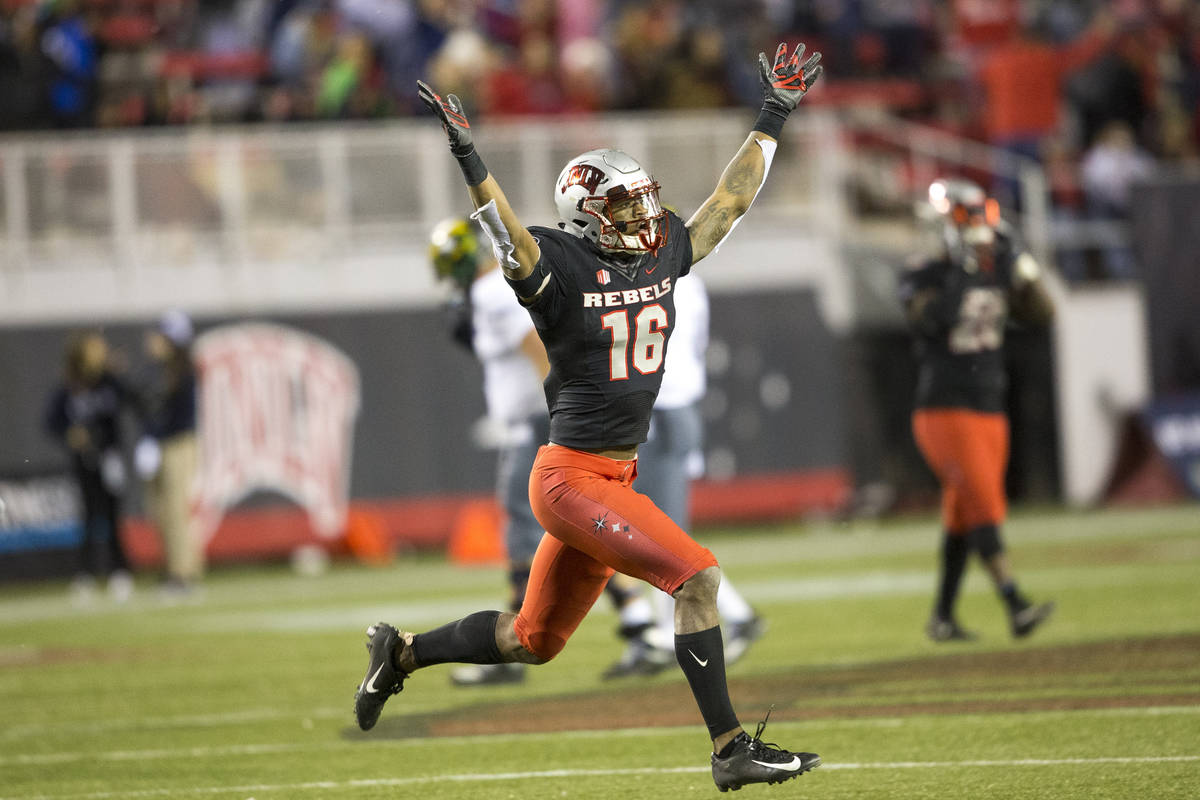 UNLV Rebels linebacker Javin White (16) celebrates his interceptions against the Nevada Wolf Pa ...