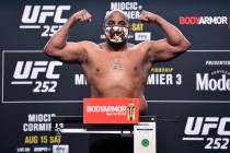 Daniel Cormier poses on the scale during the UFC 252 weigh-in at UFC APEX on August 14, 2020 in ...
