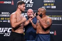 Opponents Stipe Miocic (left) and Daniel Cormier face off during the UFC 252 weigh-in at UFC AP ...