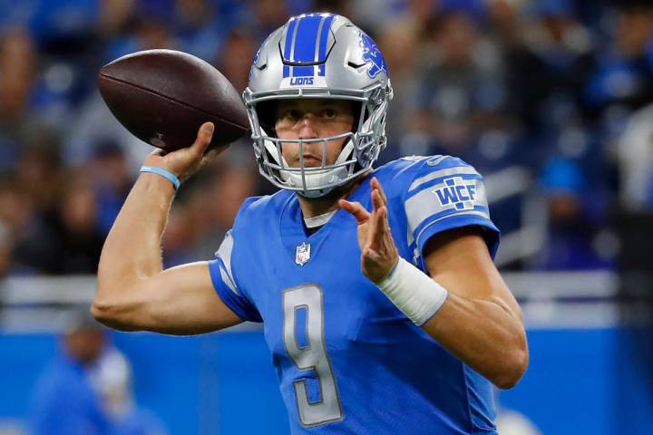 Detroit Lions quarterback Matthew Stafford throws against the New York Giants during an NFL foo ...