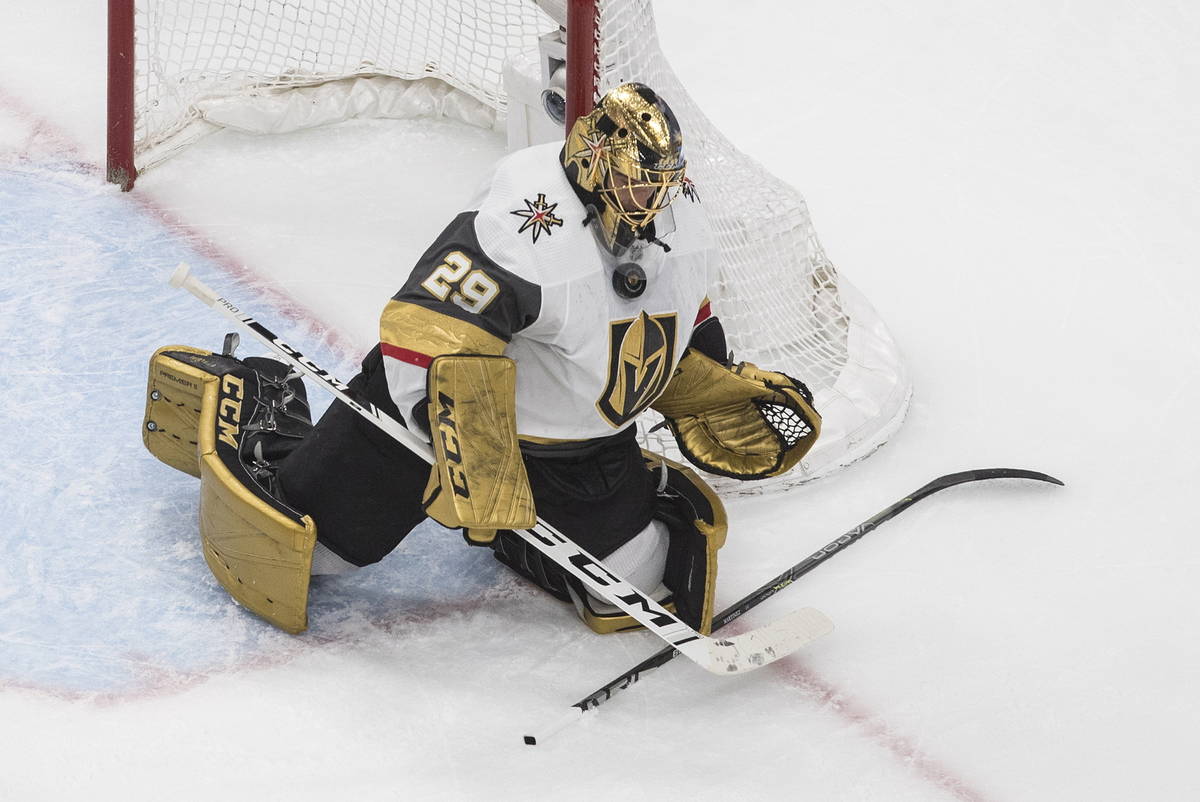 Vegas Golden Knights goalie Marc-Andre Fleury makes a save against the Chicago Blackhawks durin ...