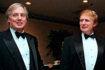 FILE - In this Nov. 3, 1999, file photo, Robert Trump, left, joins then real estate developer a ...