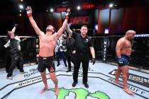 LAS VEGAS, NEVADA - AUGUST 15: Stipe Miocic celebrates after his victory over Daniel Cormier in ...