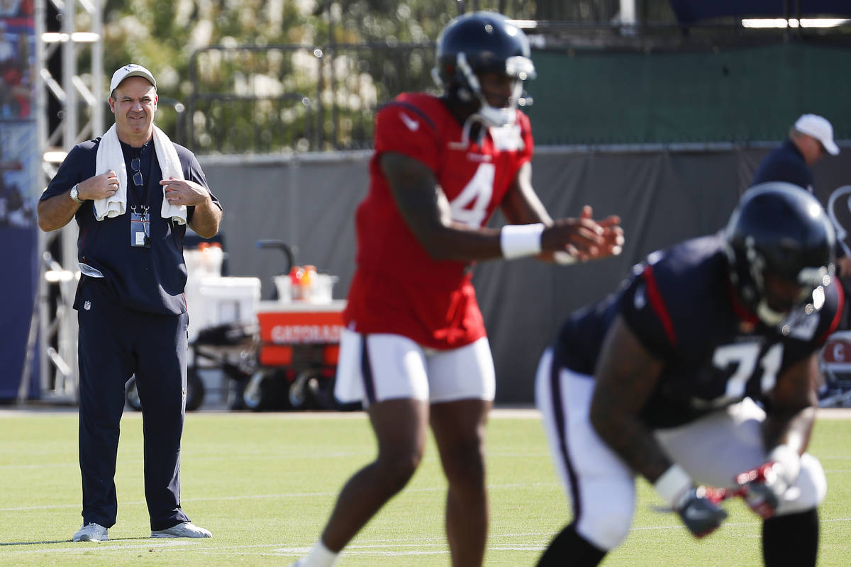 Houston Texans head coach Bill O'Brien looks on as quarterback Deshaun Watson (4) gets ready to ...