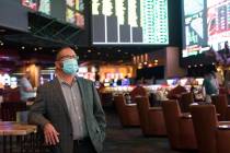 Jay Korneygay, director of the Westgate sportsbook, spends time among guests at the Westgate sp ...