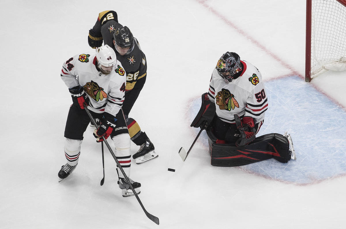 Vegas Golden Knights' Paul Stastny (26) is stopped by Chicago Blackhawks goalie Corey Crawford ...