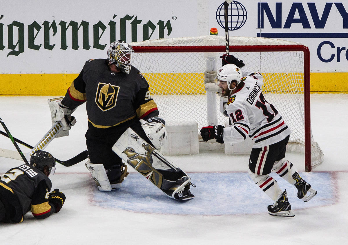 Vegas Golden Knights goalie Robin Lehner (90) is scored on by Chicago Blackhawks' Alex DeBrinca ...