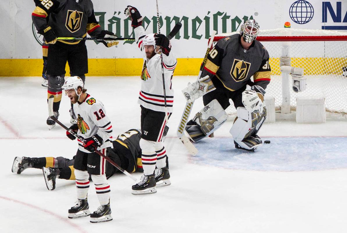 Vegas Golden Knights goalie Robin Lehner (90) reacts to being scored on as Chicago Blackhawks' ...