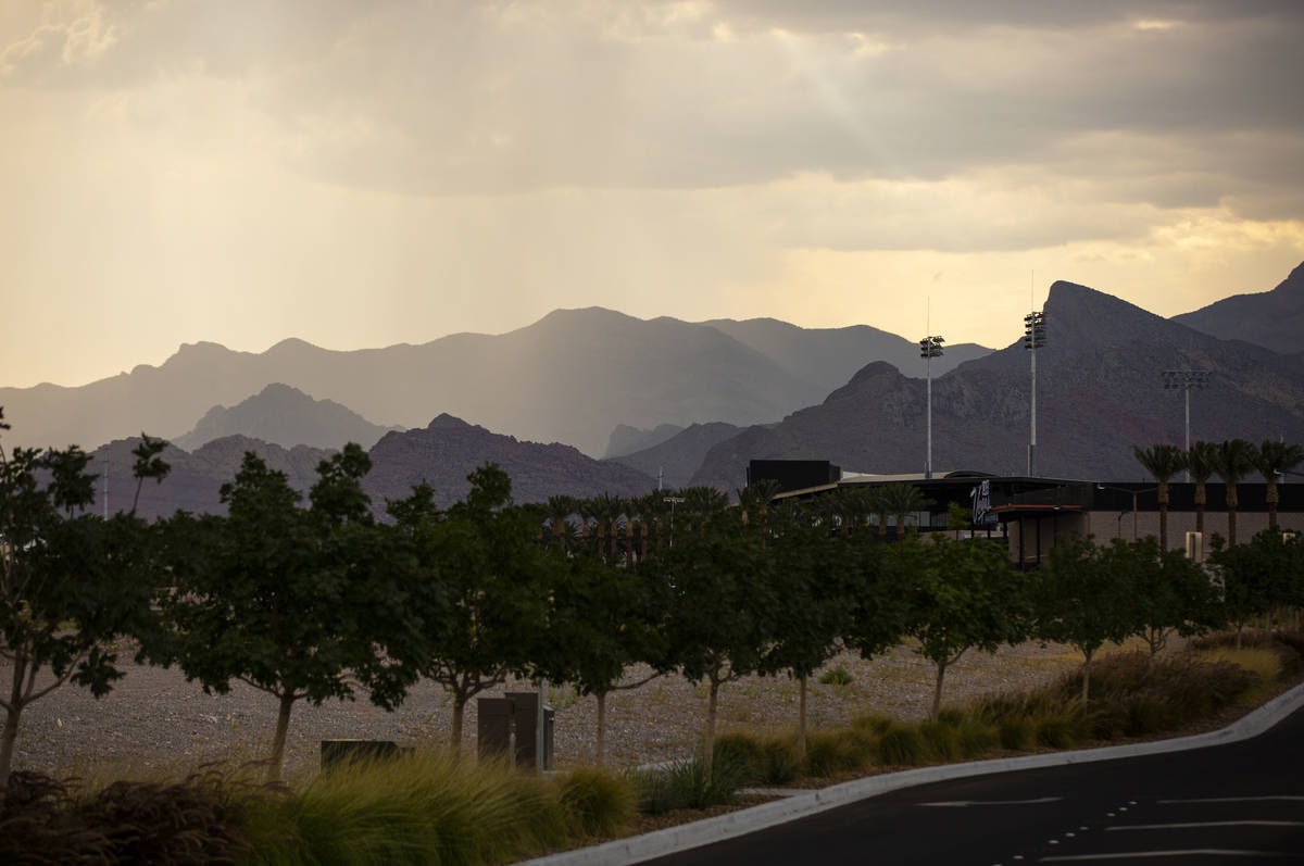 Clouds and rain in the distance beyond Downtown Summerlin in Las Vegas on Wednesday, Aug. 19, 2 ...