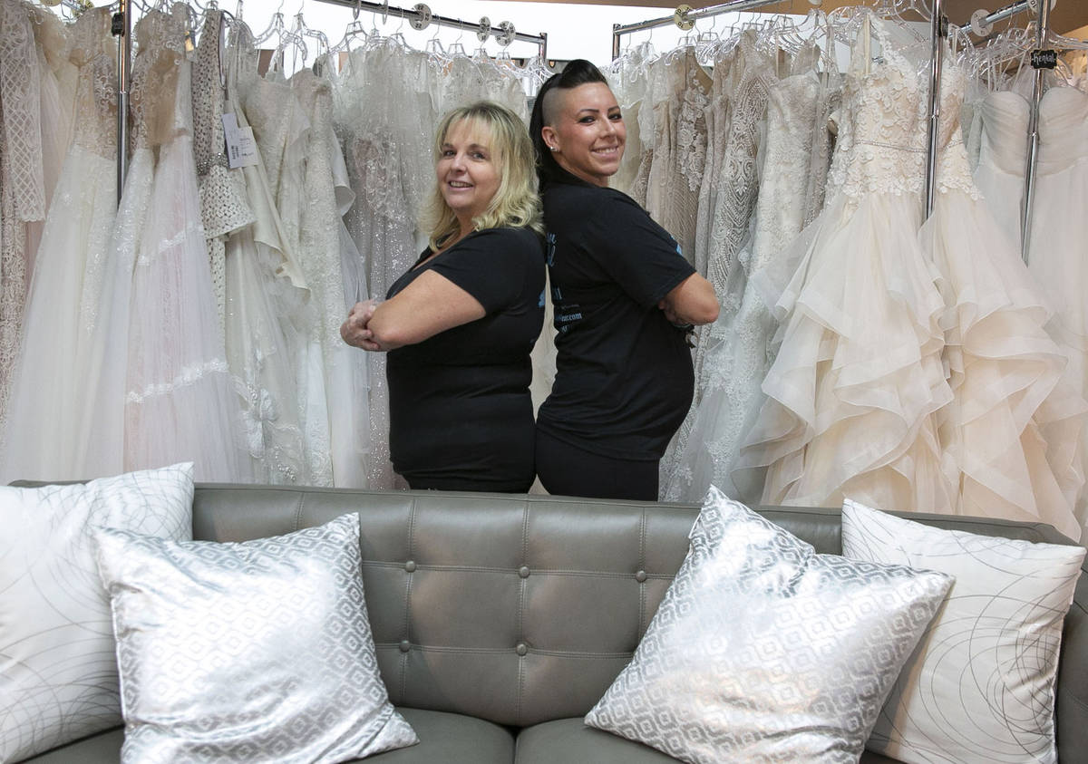 Kelly Bain, left, and Veronica Markowsky, owners of Creative Bridal Wear, pose for a photo at t ...
