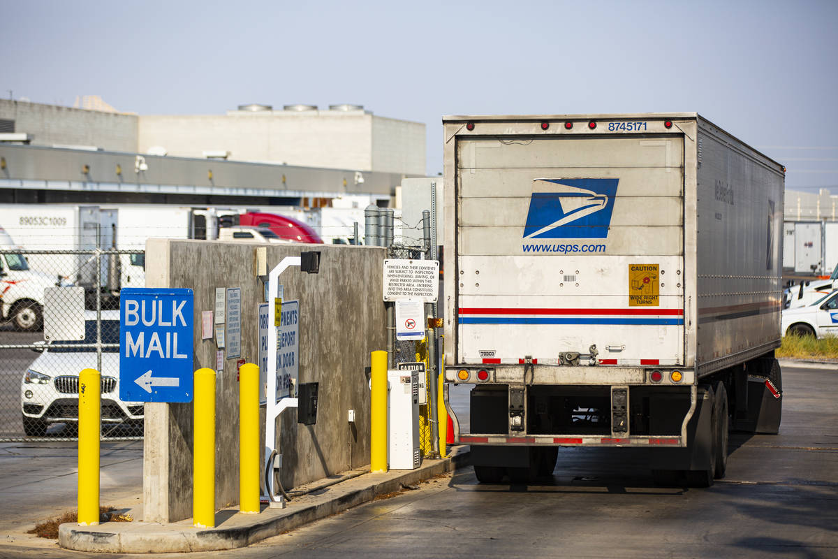 A truck arrives at the U.S. Postal Service center at 1001 E. Sunset Road in Las Vegas on Thursd ...