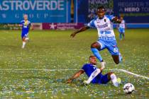 Las Vegas Lights FC's Rashawn Dally (81) chases after the ball while jumping over Reno 1868 FC' ...