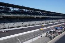 Cars drive down the main straight-a-way during the final practice session for the Indianapolis ...