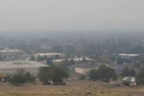 Smoke from California wildfires up to 200 miles away blankets a residential neighborhood in Spa ...