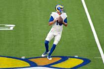 Los Angeles Rams quarterback Jared Goff looks to throw a pass during an NFL football practice S ...
