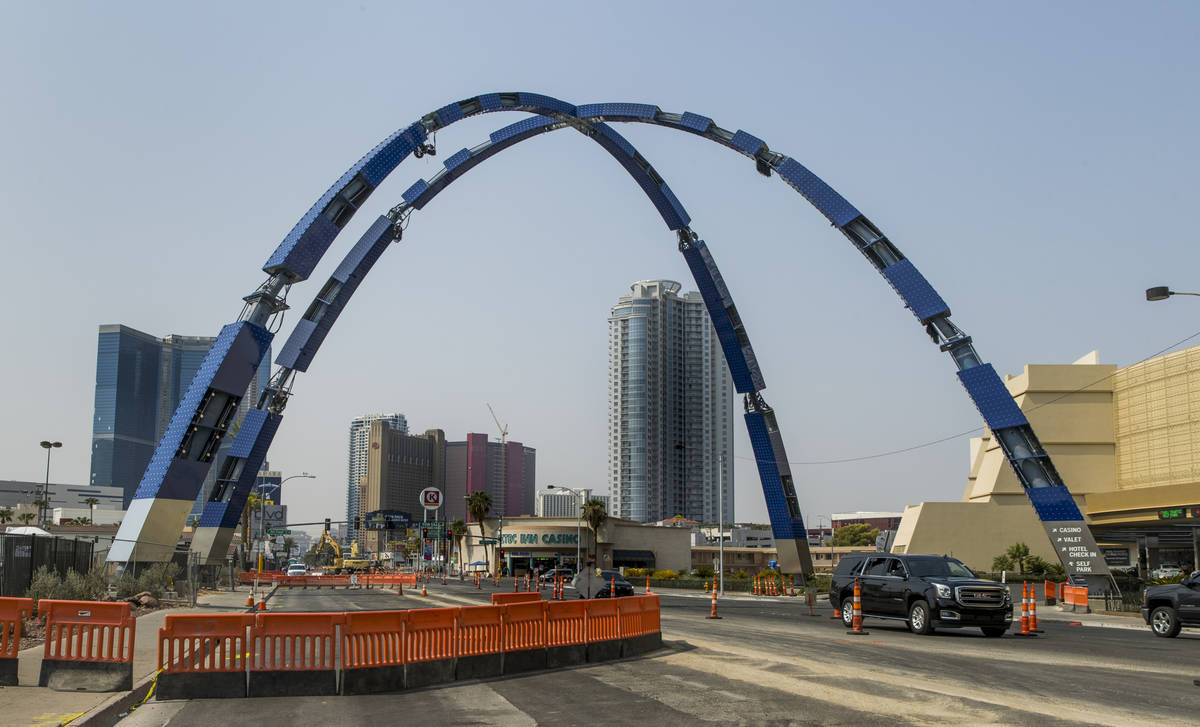 Construction continues of the 80-foot-tall gateway arch with all fours columns now attached ove ...