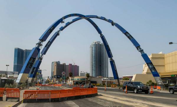 Construction continues of the 80-foot-tall gateway arch with all fours columns now attached ove ...