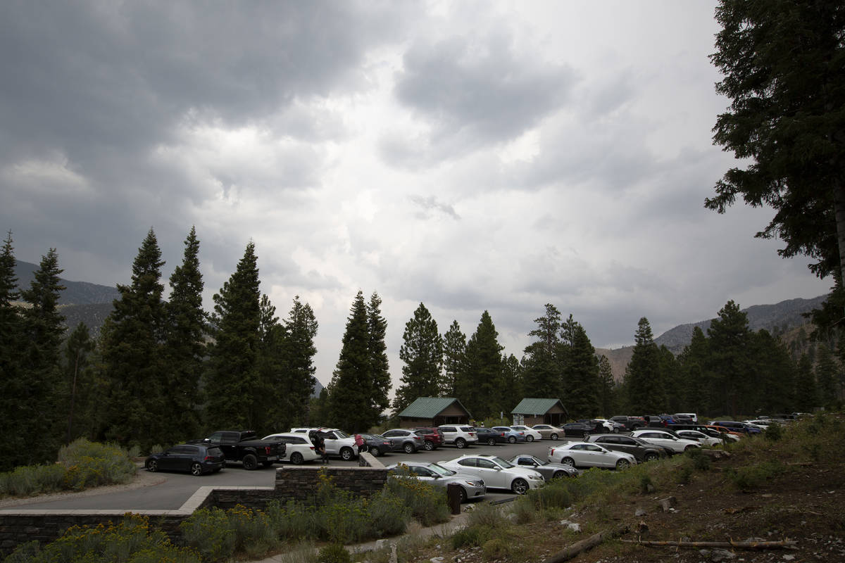 A storm rolls into the parking lot near Cathedral Rock Trail on Saturday, Aug. 22, 2020, at Spr ...