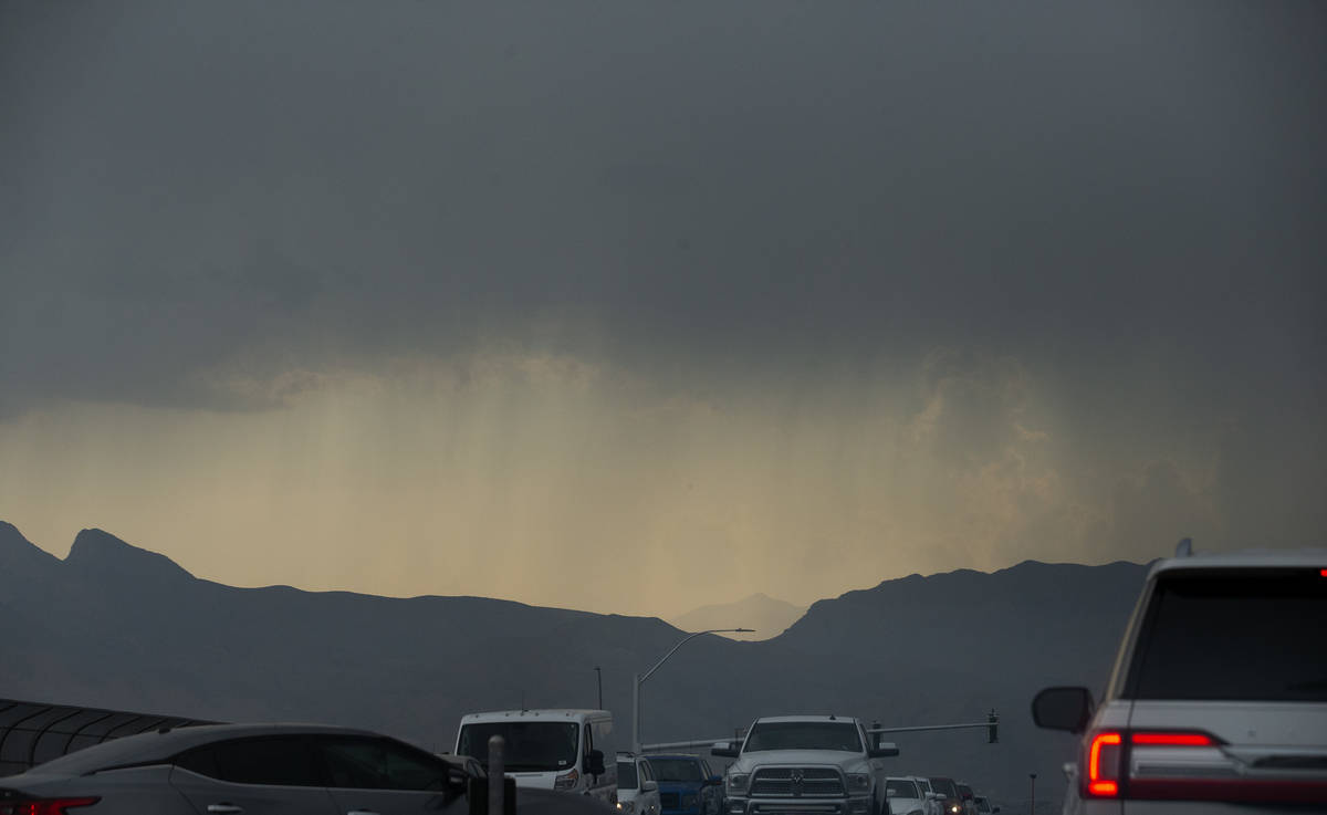 Rain clouds are seen over Spring Mountains National Recreation Area on Saturday, Aug. 22, 2020. ...