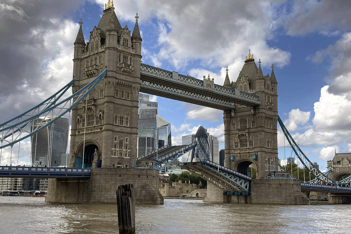 Tower Bridge crossing the River Thames is stuck open, leaving traffic in chaos and onlookers st ...