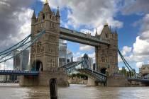 Tower Bridge crossing the River Thames is stuck open, leaving traffic in chaos and onlookers st ...