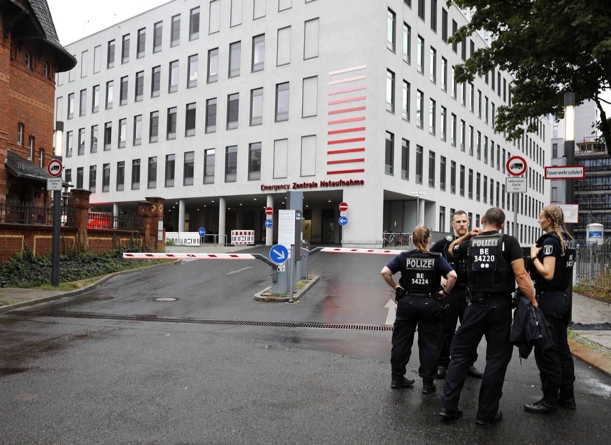 German police officers stand in front of the emergency entrance of the Charite hospital where A ...