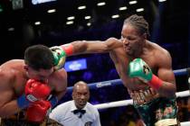 FILE - In this Sept. 8, 2018, file photo, Shawn Porter, right, punches Danny Garcia during the ...