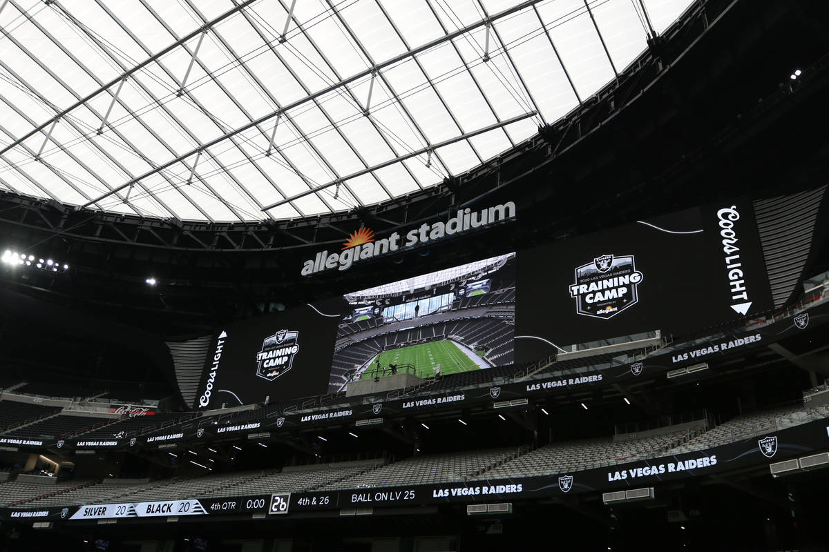 A billboard over the north end zone seating prior to a Las Vegas Raiders team practice at Alleg ...