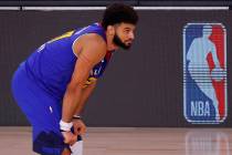 Denver Nuggets' Jamal Murray reacts during the fourth quarter against the Utah Jazz in Game 4 o ...