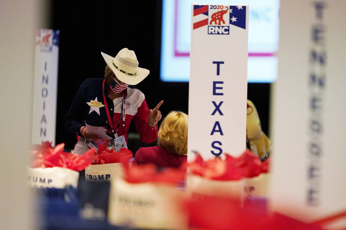 The room is set and delegates begin to arrive for the first day of the Republican National Conv ...