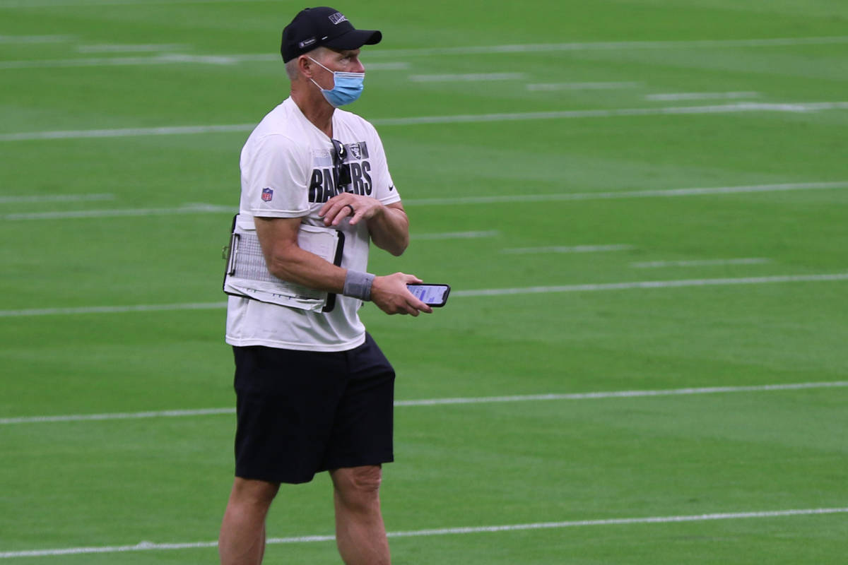 Las Vegas Raiders general manager Mike Mayock on the field prior to a team practice at Allegian ...