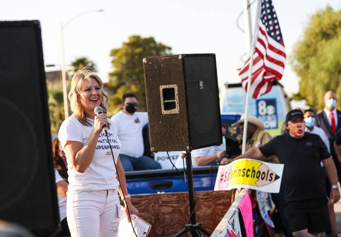 Erin Phillips, president of Power2Parent, speaks during a demonstration in support of reopening ...