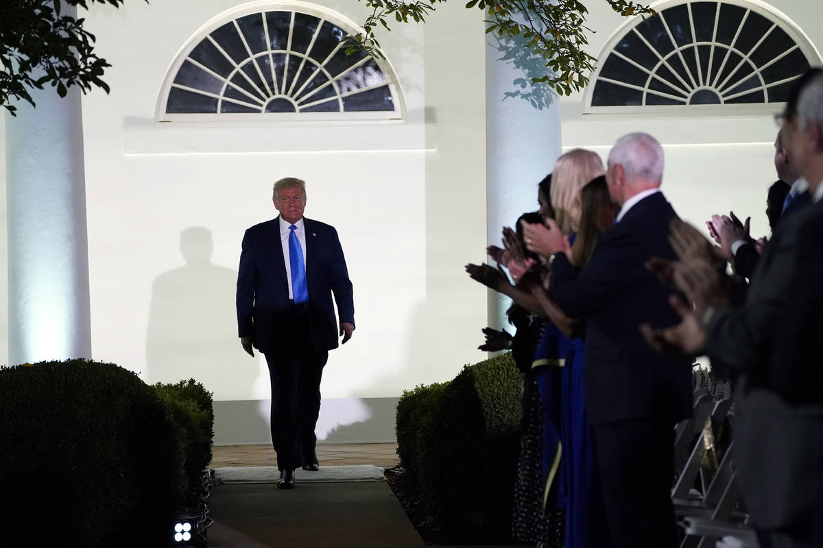 President Donald Trump arrives to listen to first lady Melania Trump speak during the 2020 Repu ...