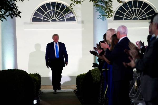 President Donald Trump arrives to listen to first lady Melania Trump speak during the 2020 Repu ...