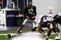 Las Vegas Raiders wide receiver Zay Jones stretches during an NFL training camp practice in Hen ...