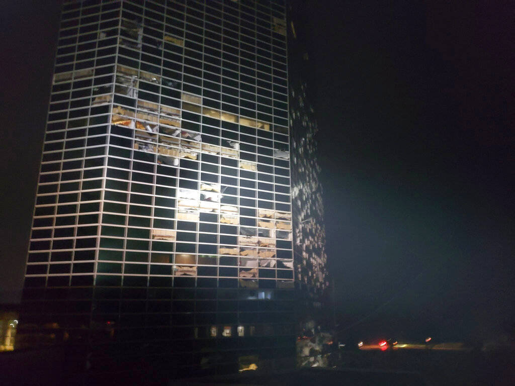 A building that was damaged overnight by Hurricane Laura stands in Lake Charles, La., Thursday, ...