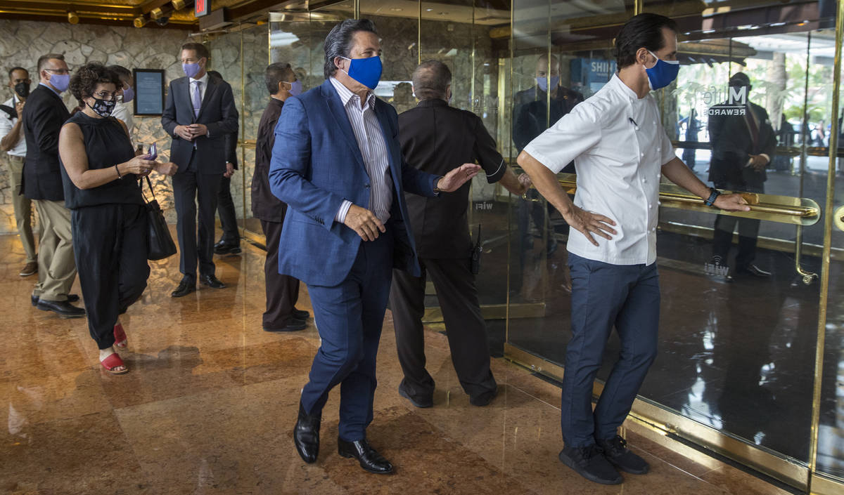 CEO and President of MGM Resorts International Bill Hornbuckle, center, assembles his employees ...