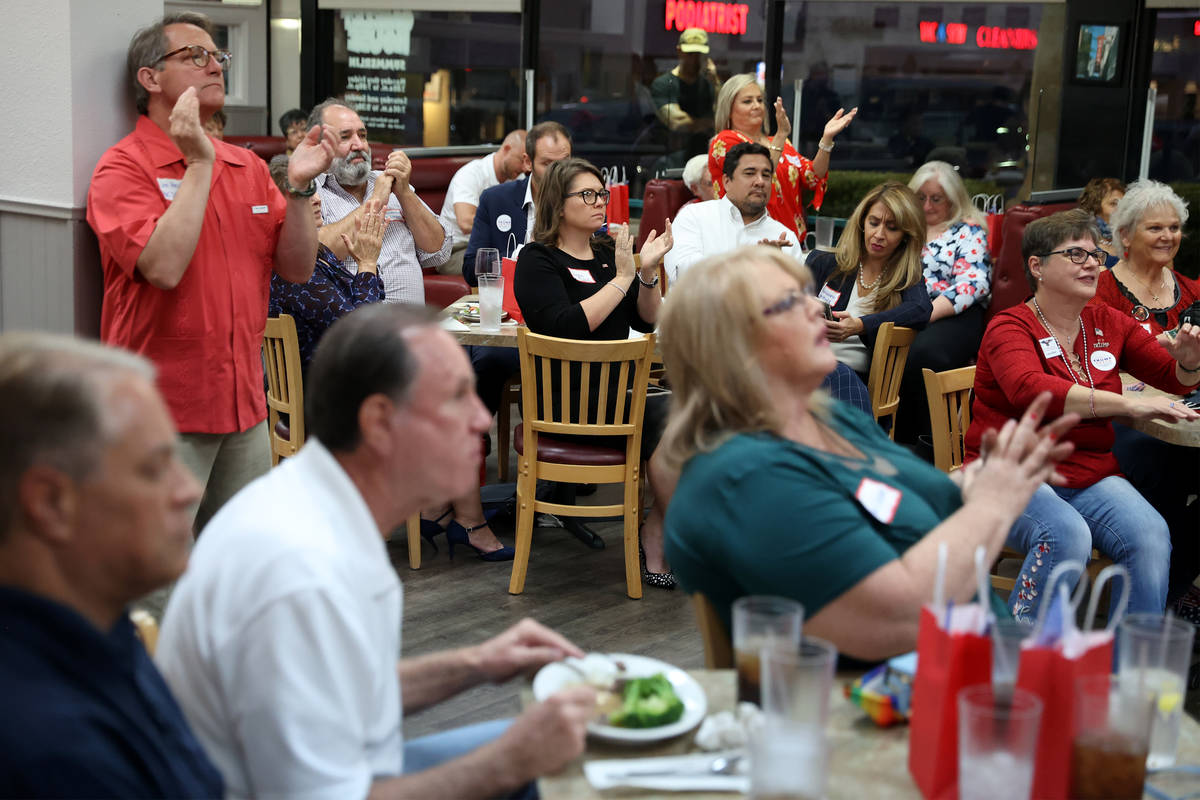 People attend a Republican National Convention watch party at the Omelet House in Las Vegas, Th ...