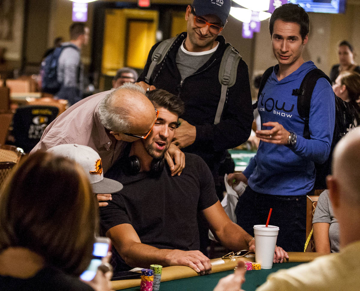 Bejan Esfandiari, father of poker star Antonio Esfandiari, gives Olympic swimmer Michael Phelps ...