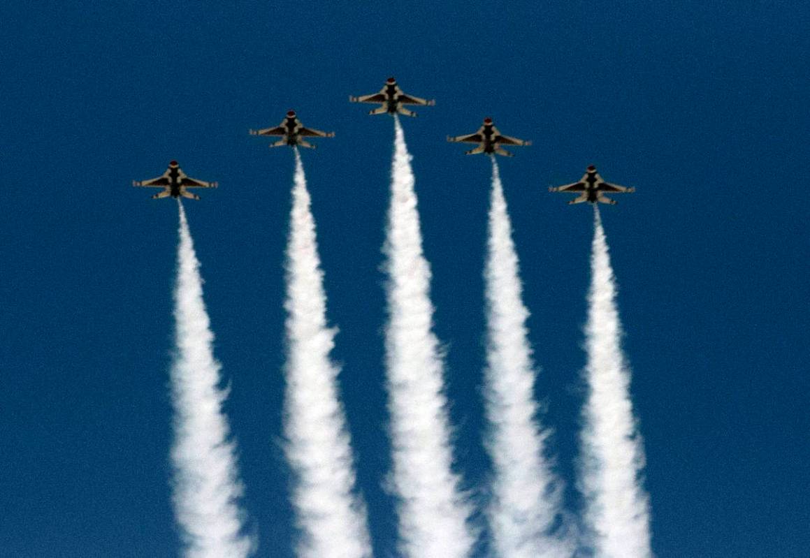 The U.S. Air Force Air Demonstration Squadron "Thunderbirds" do a flyover Red Rock Ca ...