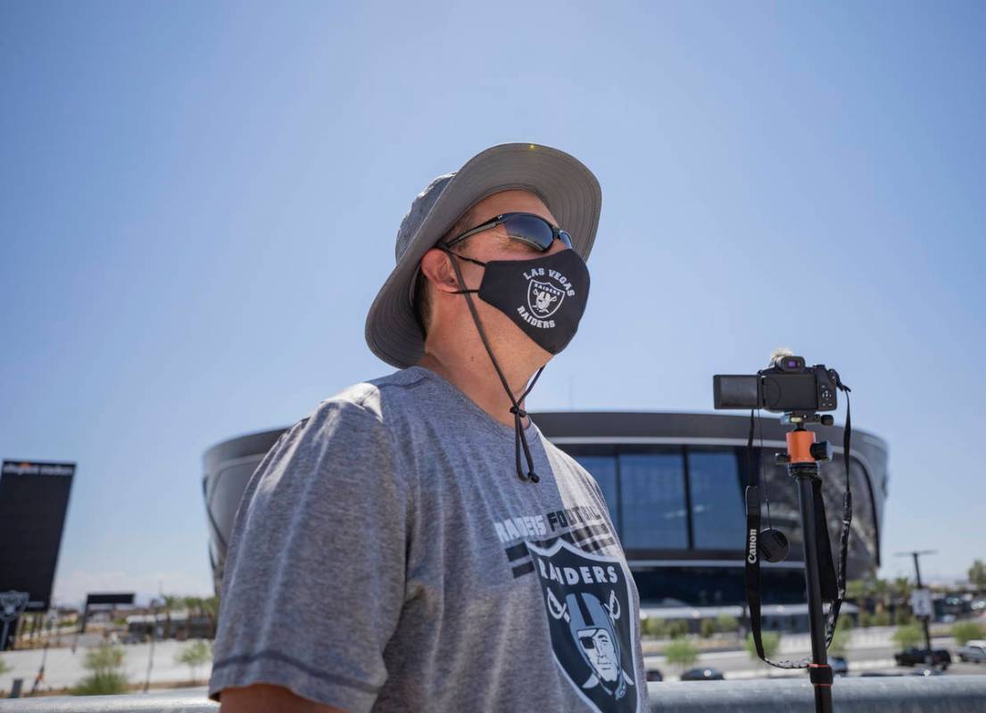 YouTuber Marc DiLisio of Las Vegas looks over the horizon to see the U.S. Air Force Thunderbird ...