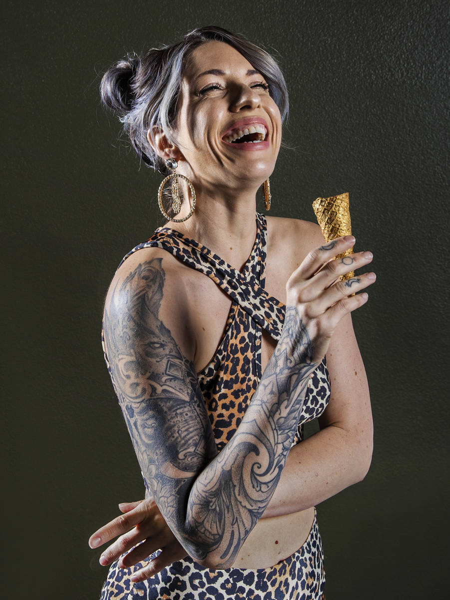 Founder and head creamstress Valerie Stunning, a former exotic dancer, holds an ice cream cone ...