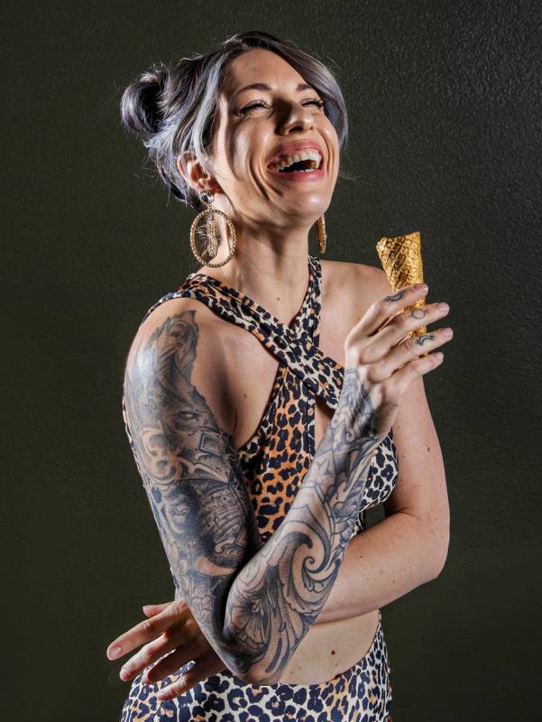 Founder and head creamstress Valerie Stunning, a former exotic dancer, holds an ice cream cone ...
